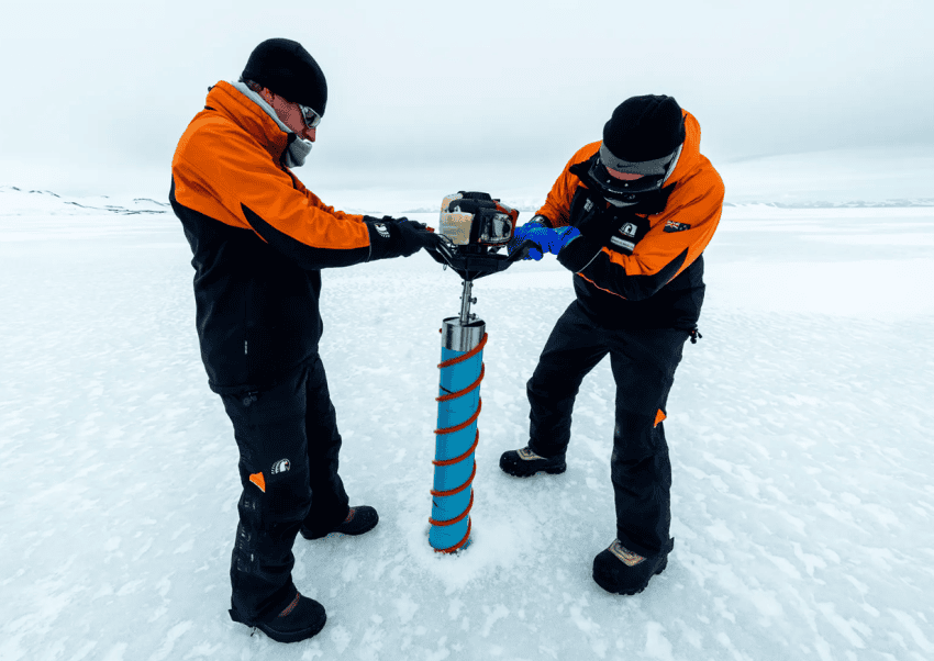 Researchers drill core samples from the sea ice near McMurdo Station in McMurdo Sound, Antarctica. To examine the composition of Earth's atmosphere in the past, the ice itself is melted and analyzed by mass spectrometry to obtain oxygen and hydrogen isotopes, whose ratios help with understanding some of the details of past climates.